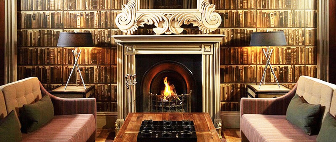	The Bishopstrow Hotel & Spa Library and Fireplace