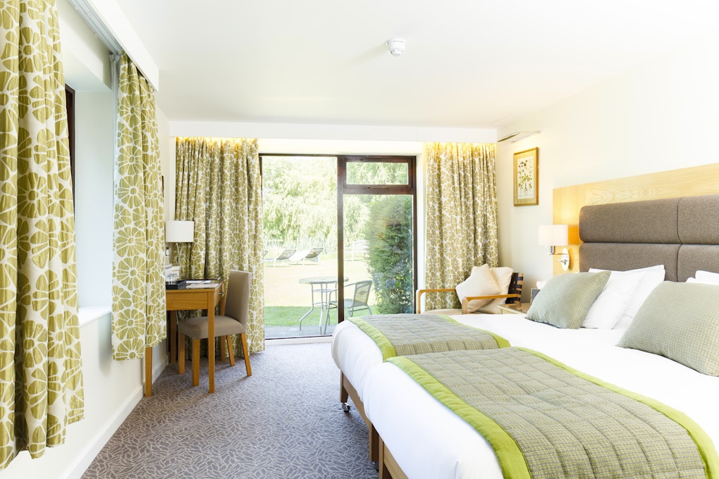Champneys Springs Spa Resort Bedroom with Patio Doors