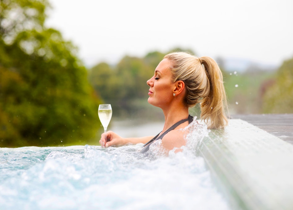 Nadarra Spa at The Coniston Hotel and Country Estate Lady in Outdoor Infinity Pool with Fizz