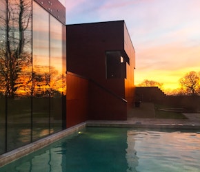 Ockenden Manor Hotel and Spa Outdoor Pool at Sunset