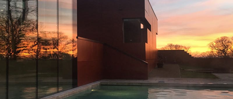 Ockenden Manor Hotel and Spa Pool at Sunset