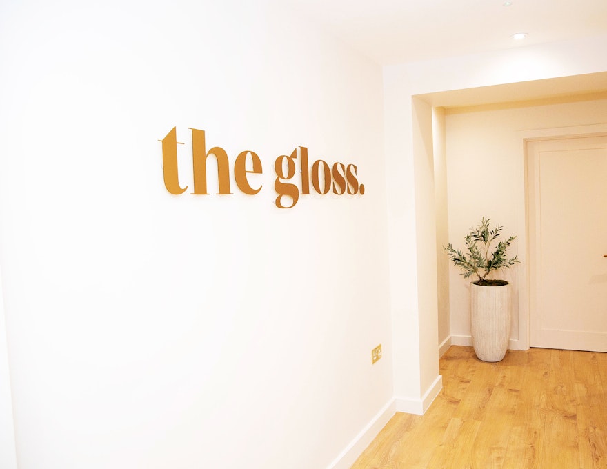 The Gloss Corridor Sign
